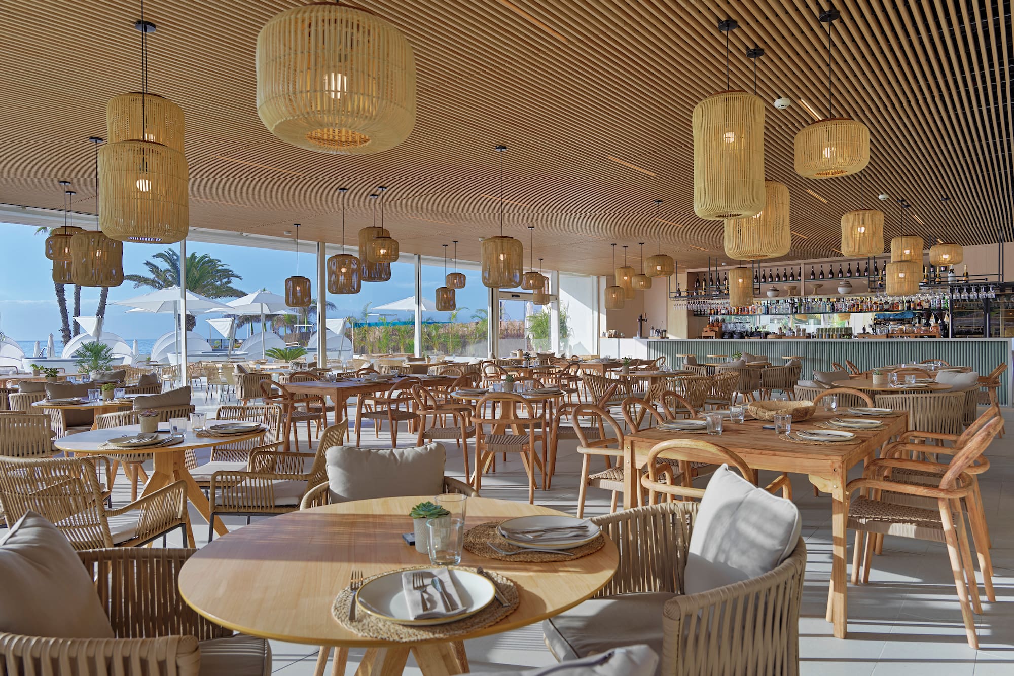 a restaurant with tables and chairs