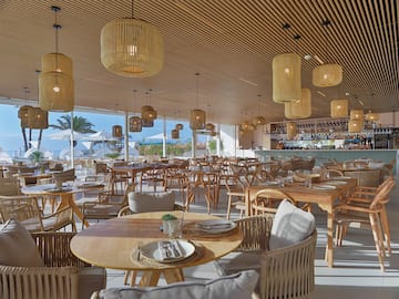 a restaurant with tables and chairs