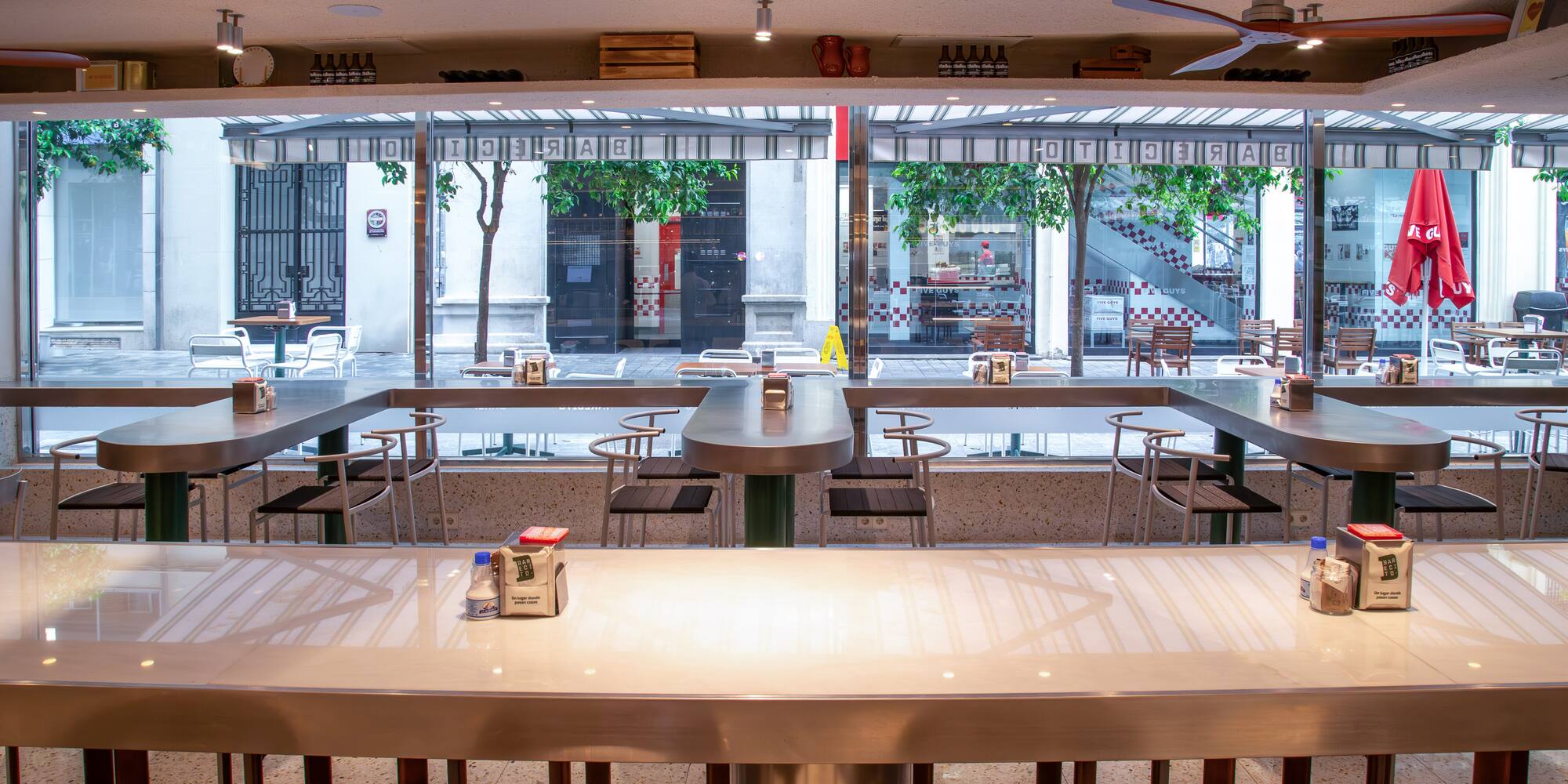 a large empty restaurant with tables and chairs