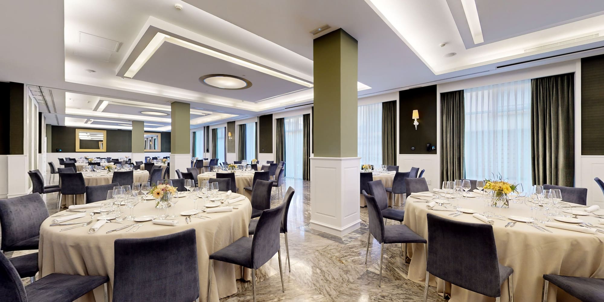 a room with tables and chairs