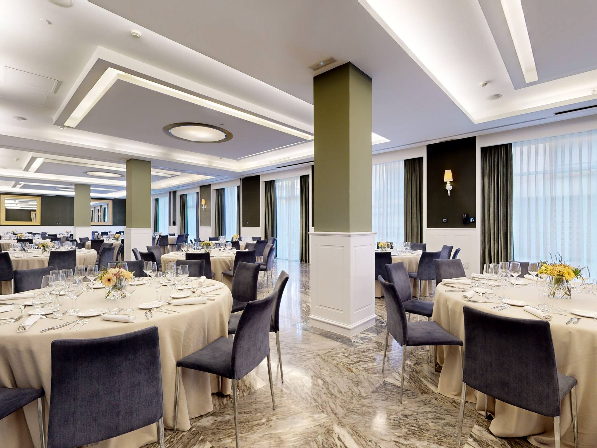 a room with tables and chairs