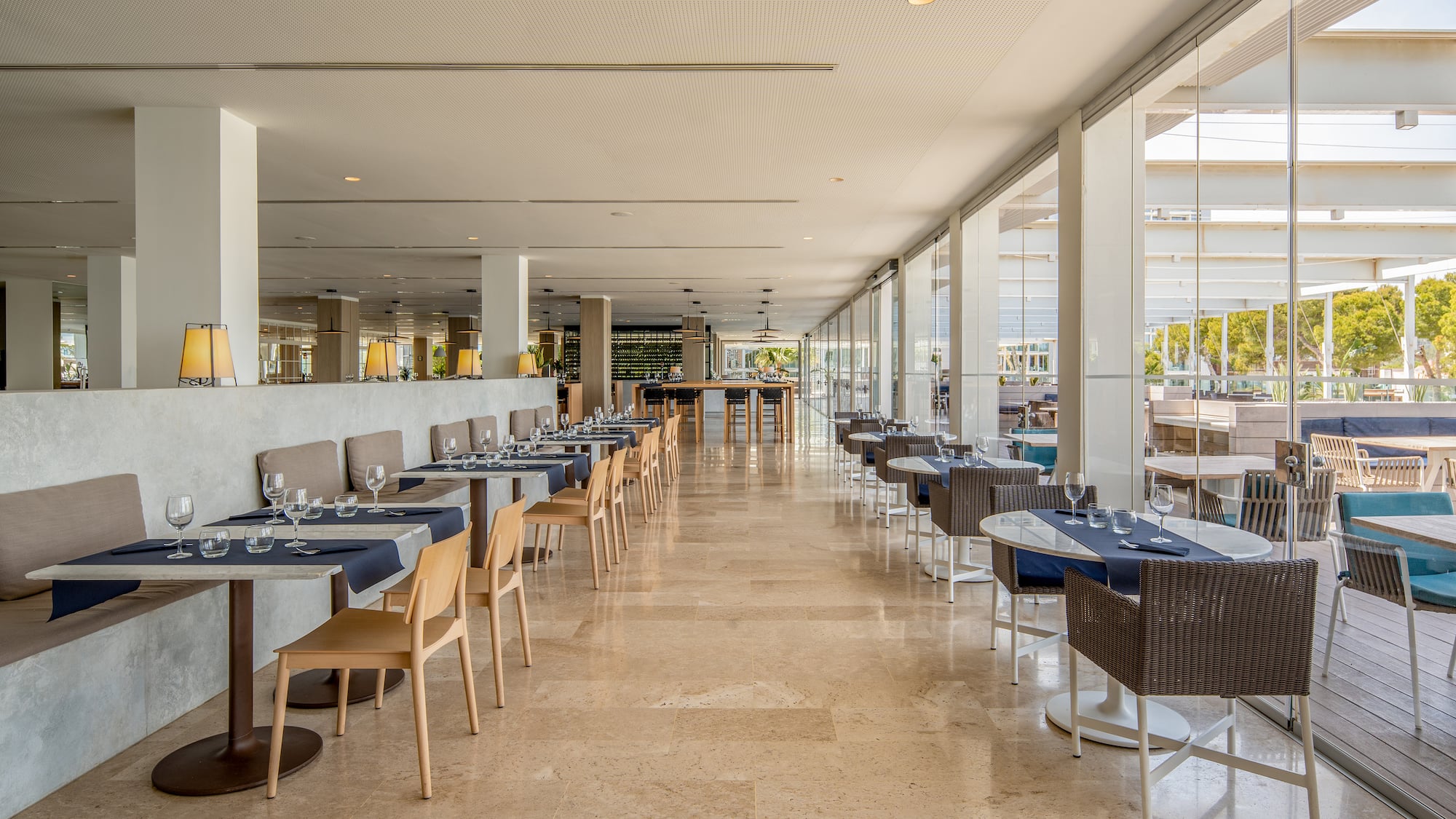 a restaurant with tables and chairs