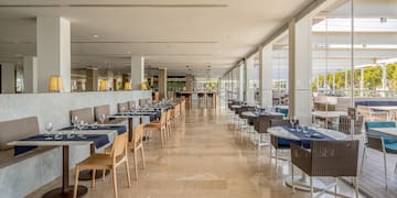a restaurant with tables and chairs