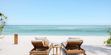 two chairs on a beach