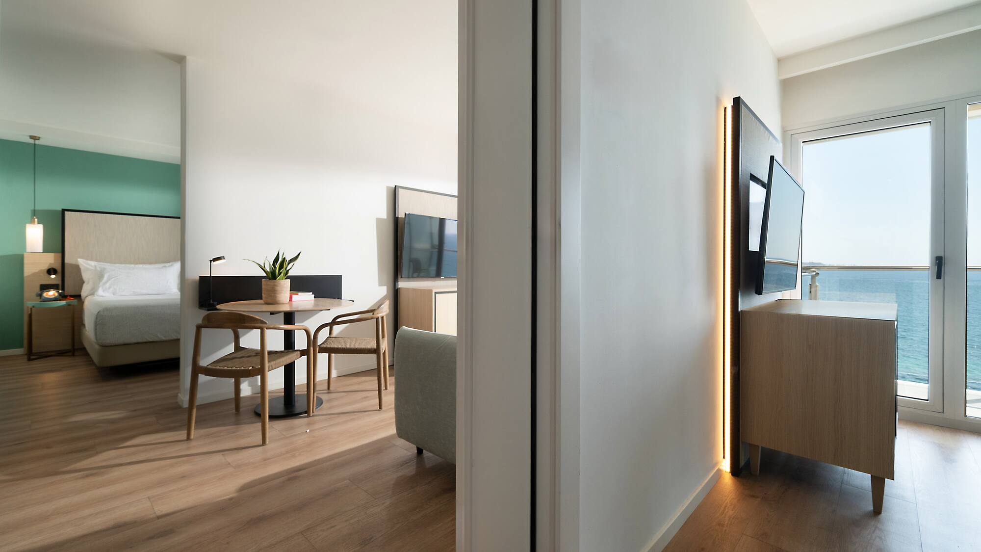 a room with a tv and a table