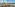 Resort restaurant balcony with ocean view, set tables, and tropical palm trees.