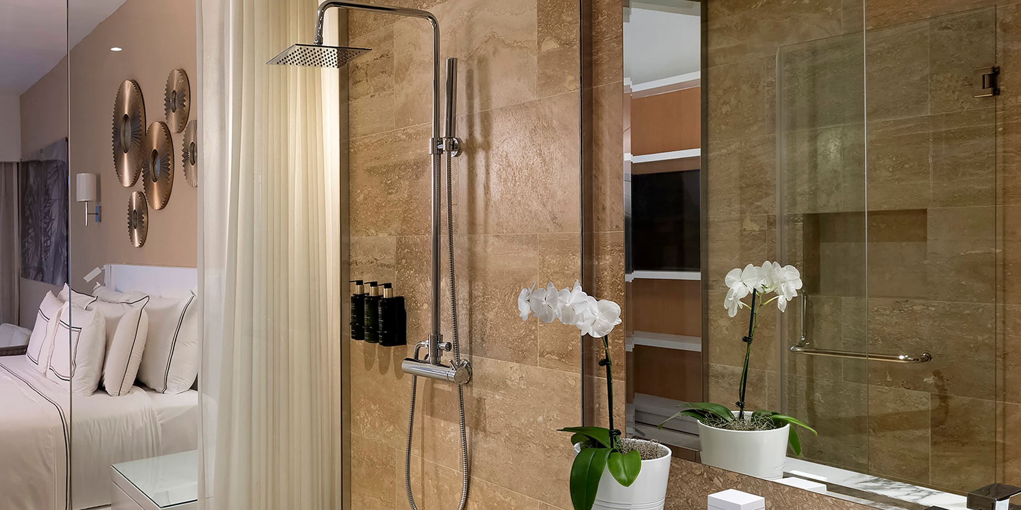 a bathroom with a shower and sink