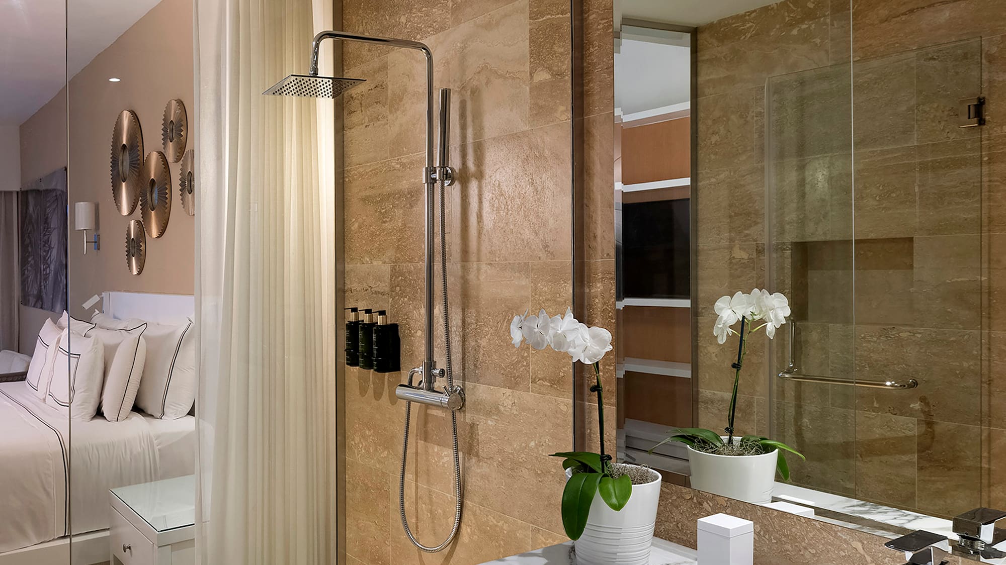 a bathroom with a shower and sink