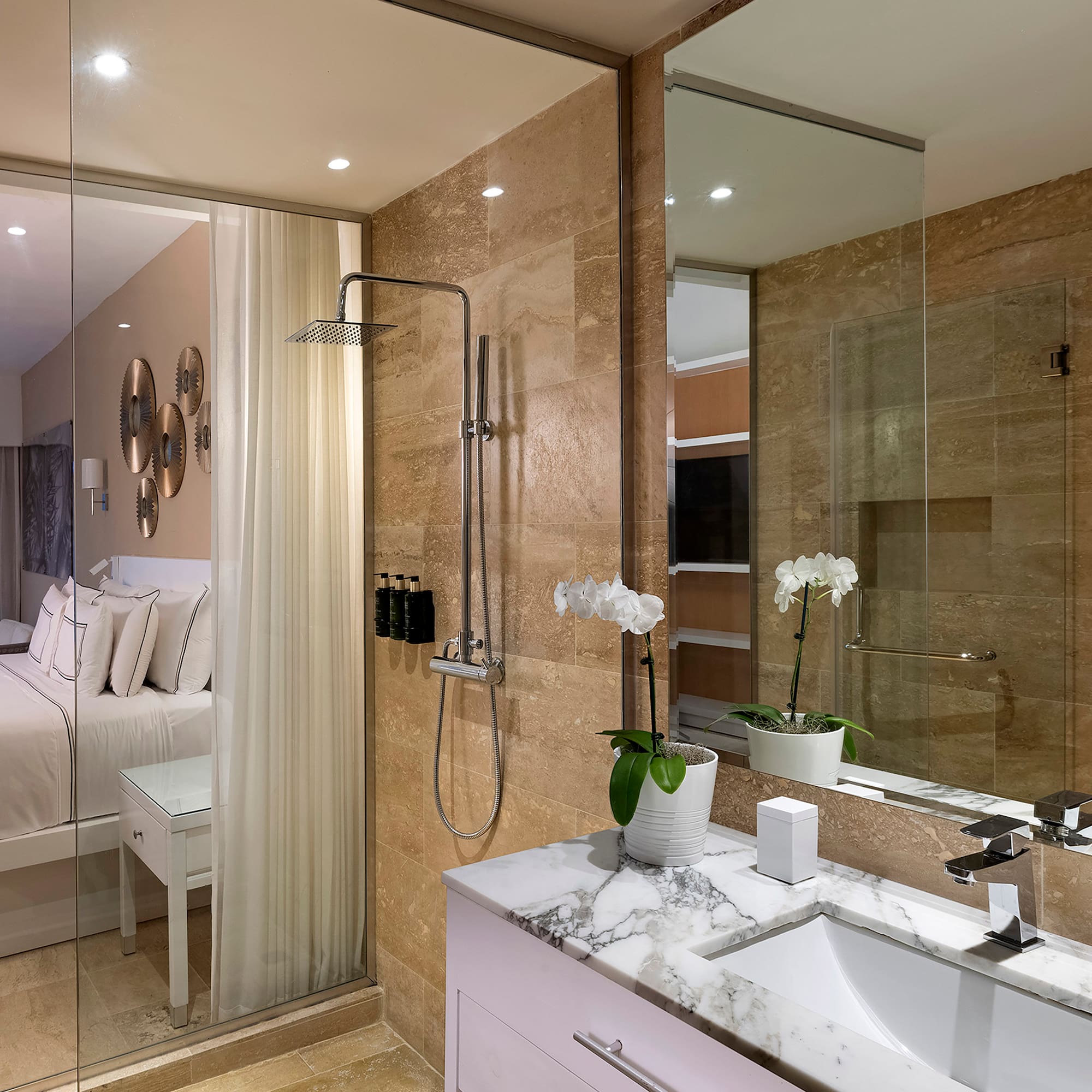 a bathroom with a shower and sink