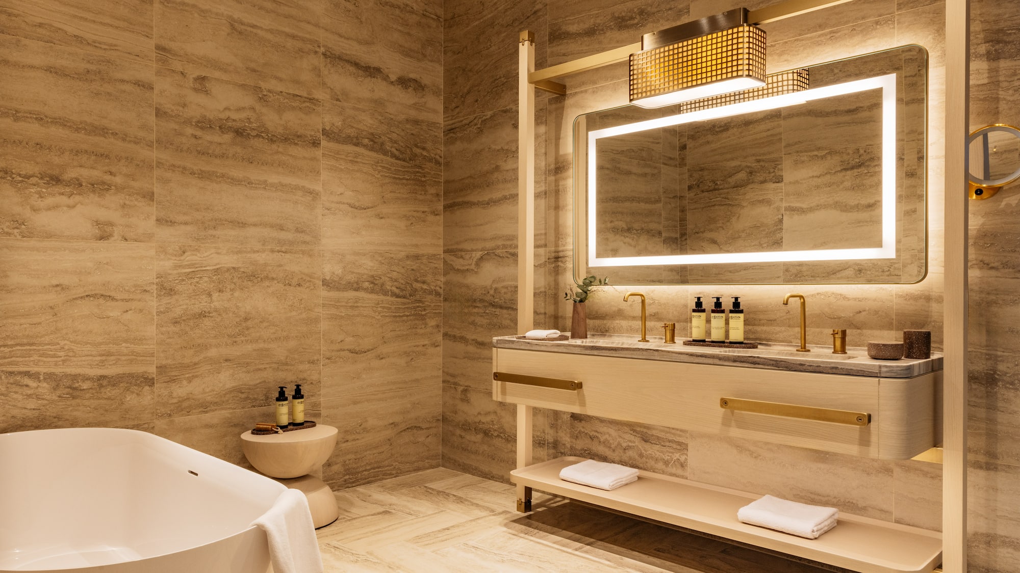 a bathroom with a tub and sink