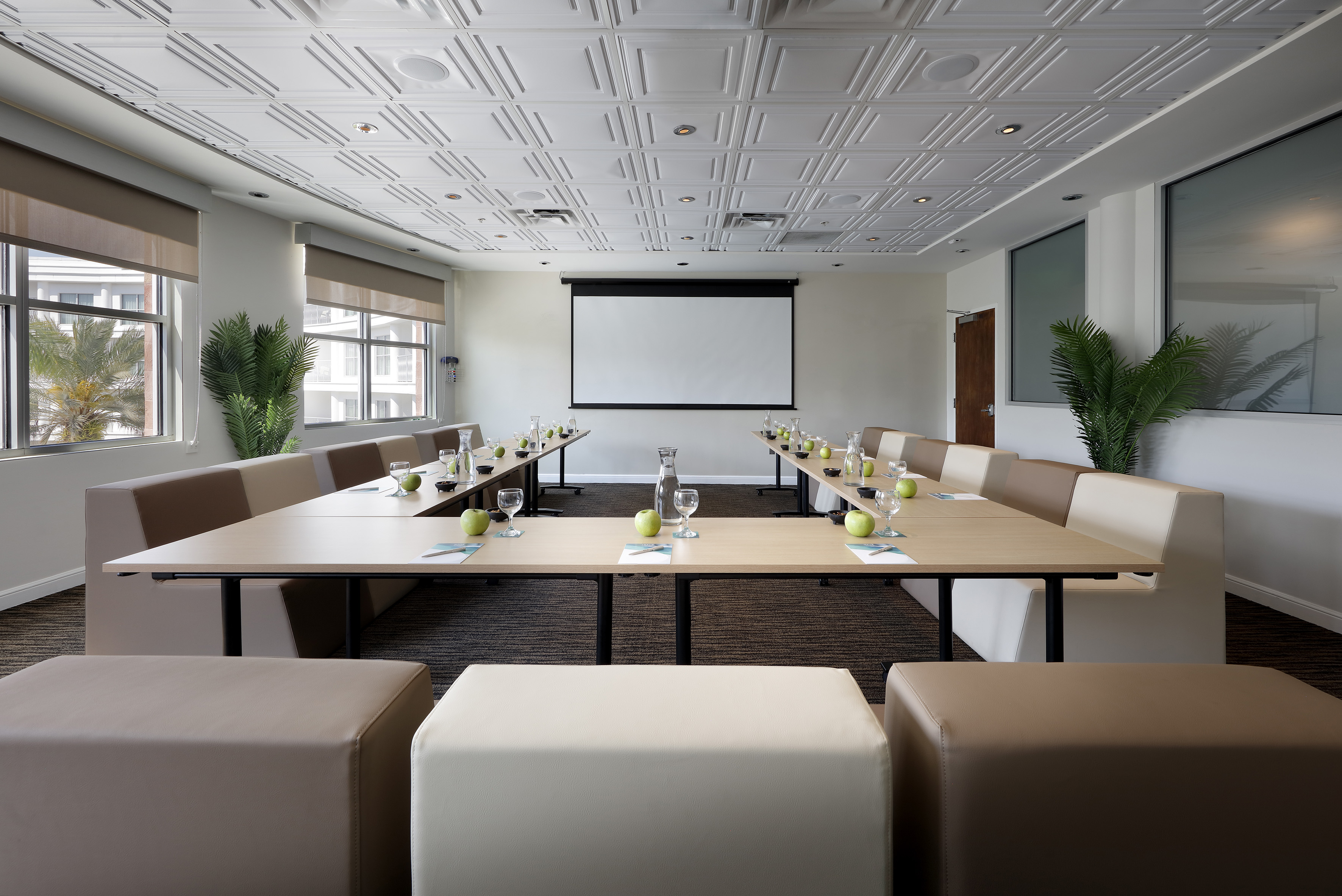 a room with tables and chairs