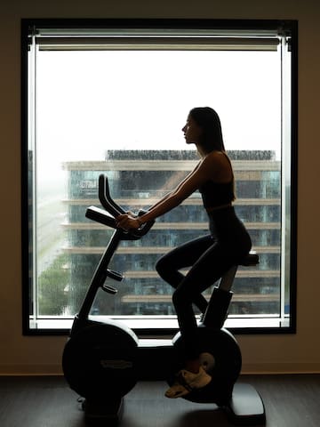 a woman on an exercise bike