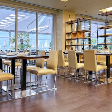 a room with tables and chairs