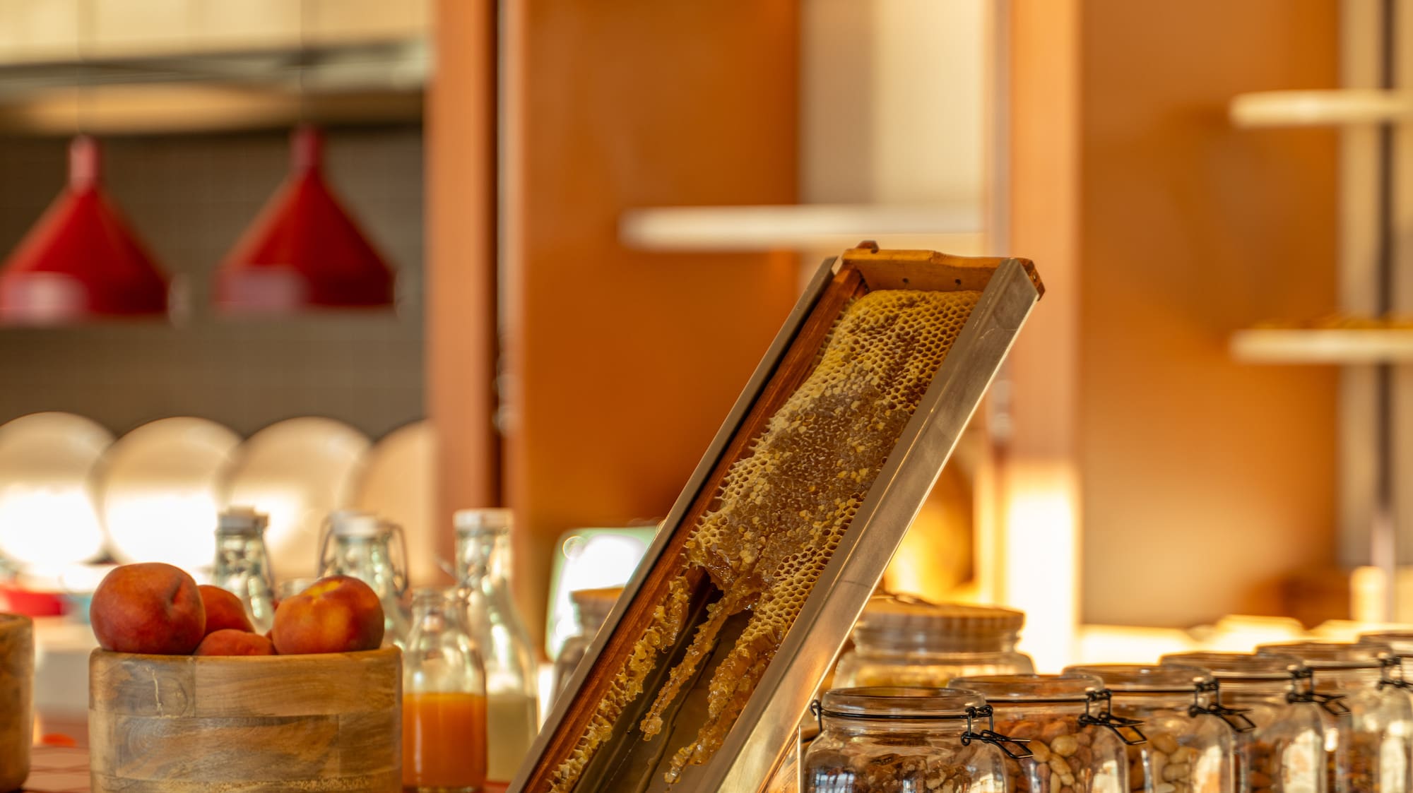 a counter with jars of food and a shelf with a shelf with food