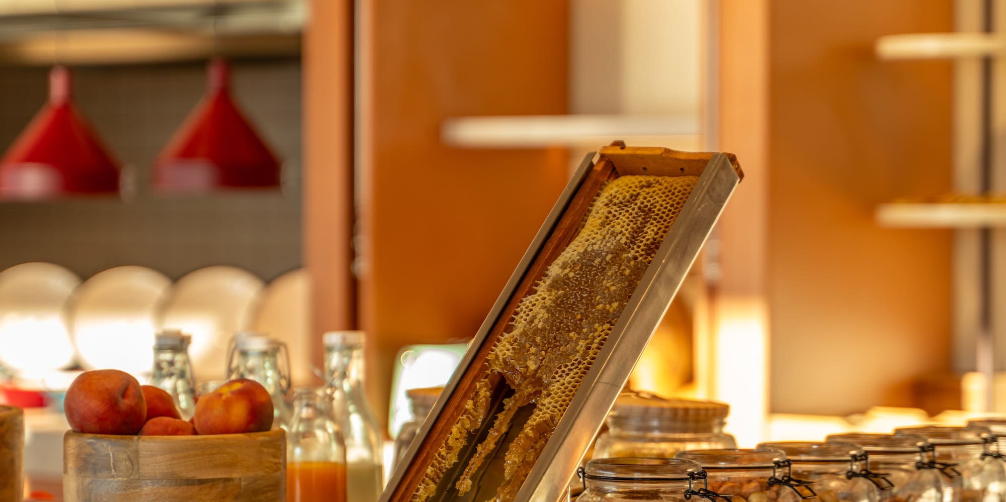 a counter with jars of food and a shelf with a shelf with food