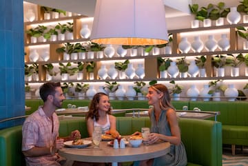 a group of people sitting at a table