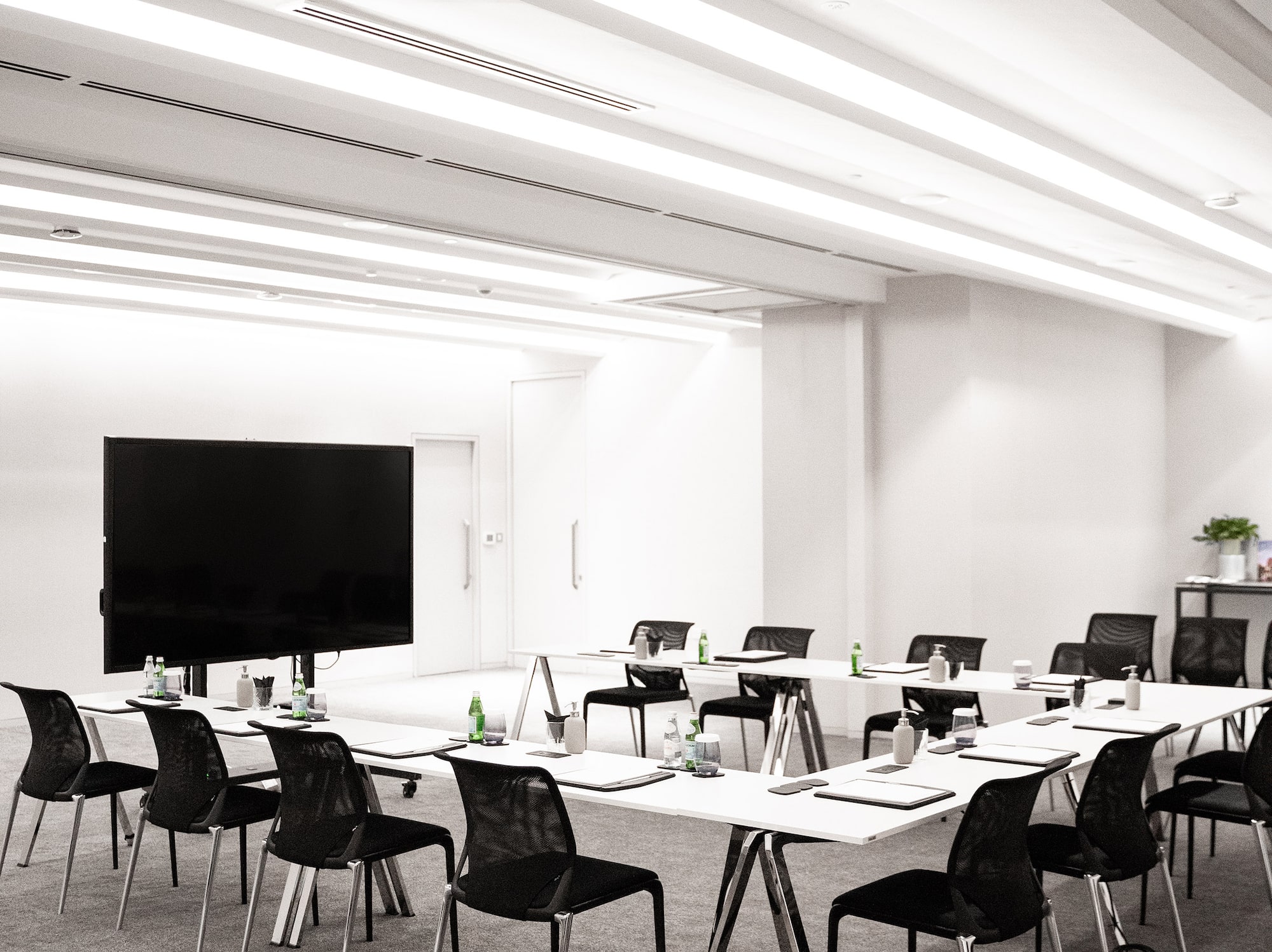 a room with tables and chairs