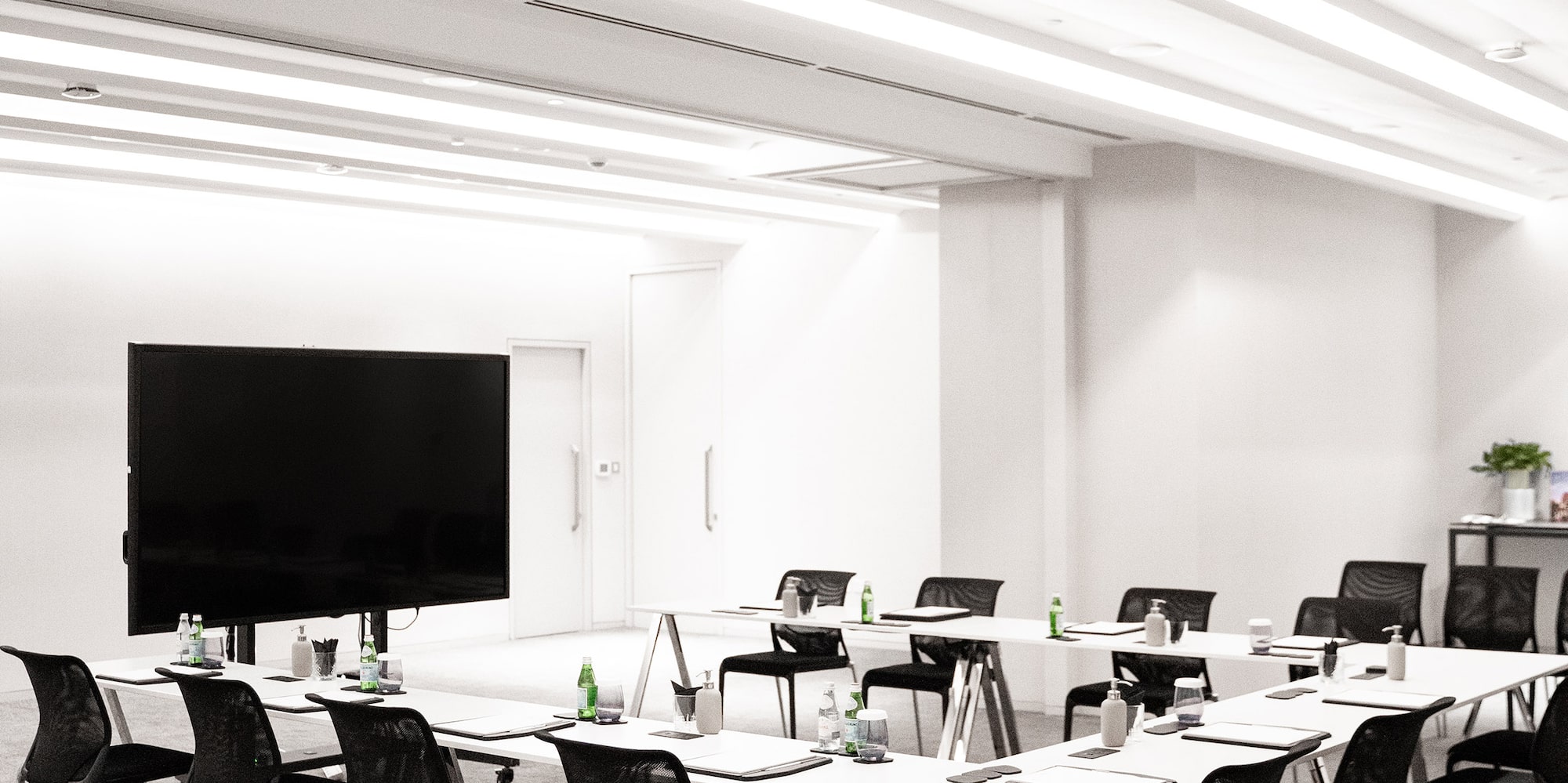 a room with tables and chairs