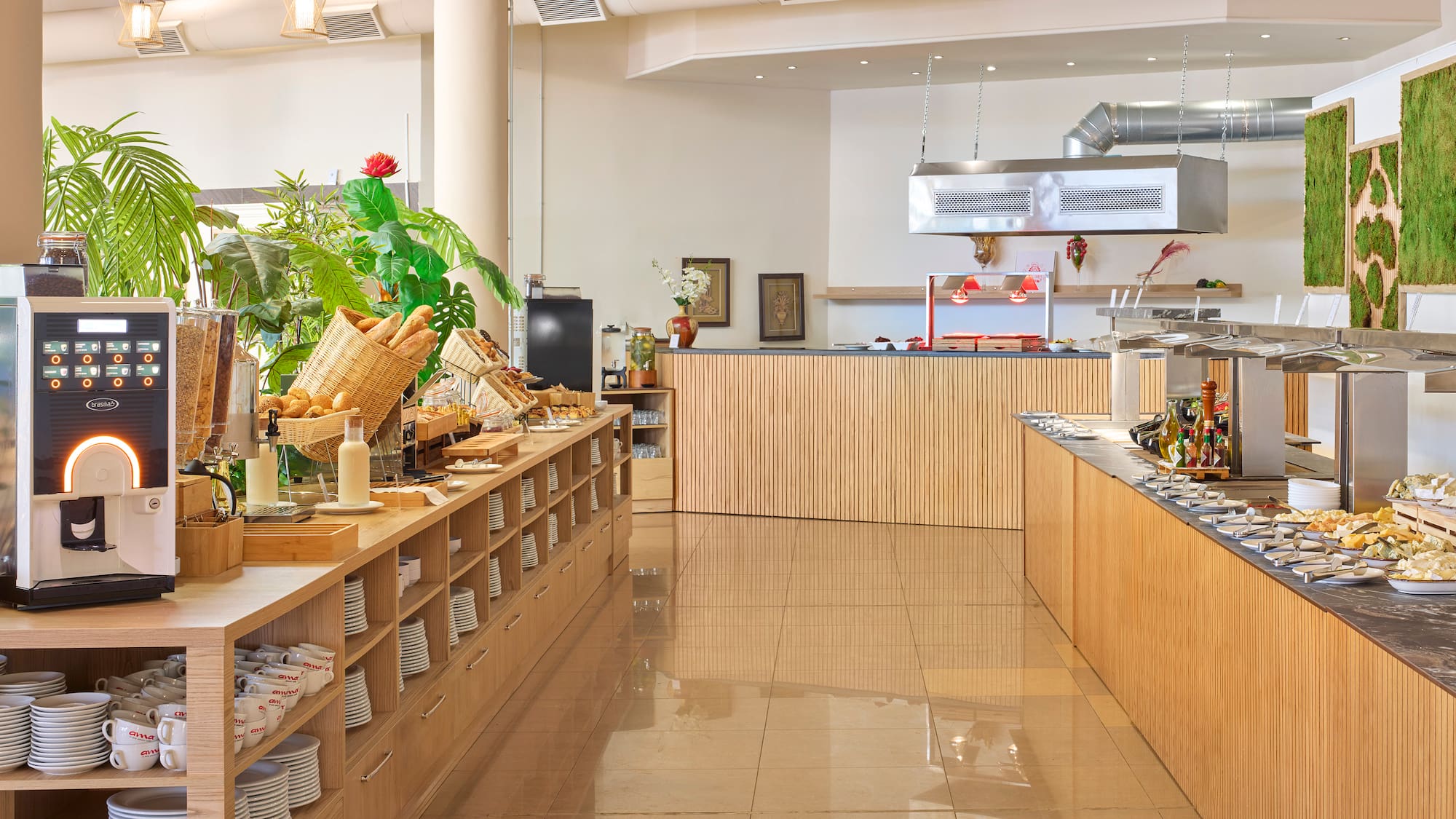 a kitchen with a buffet and a plant