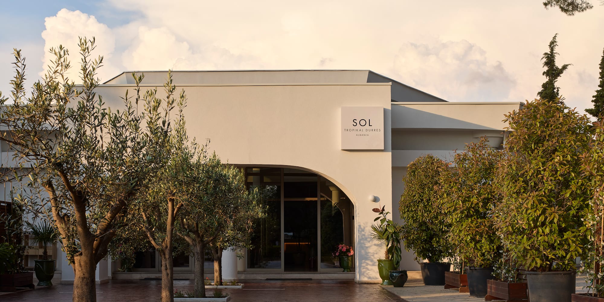 a building with trees in front of it