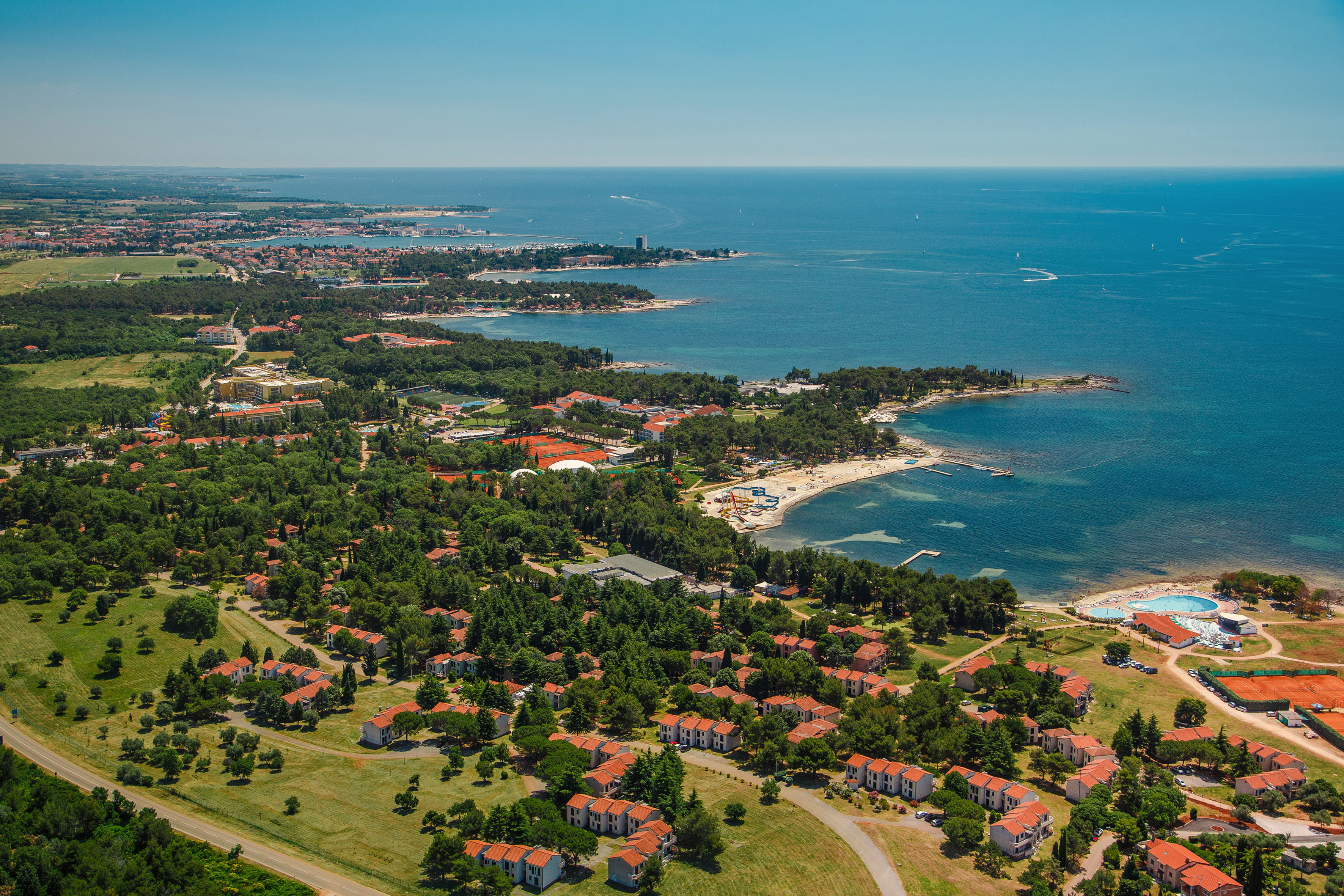 a aerial view of a town by the water