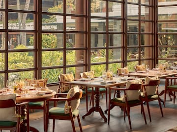 a room with tables and chairs