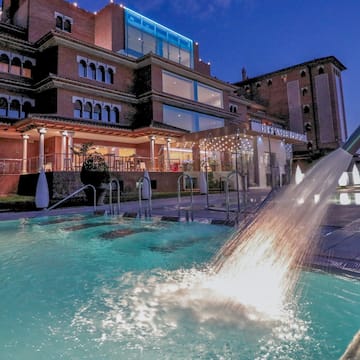 a pool with a water spouting out of it