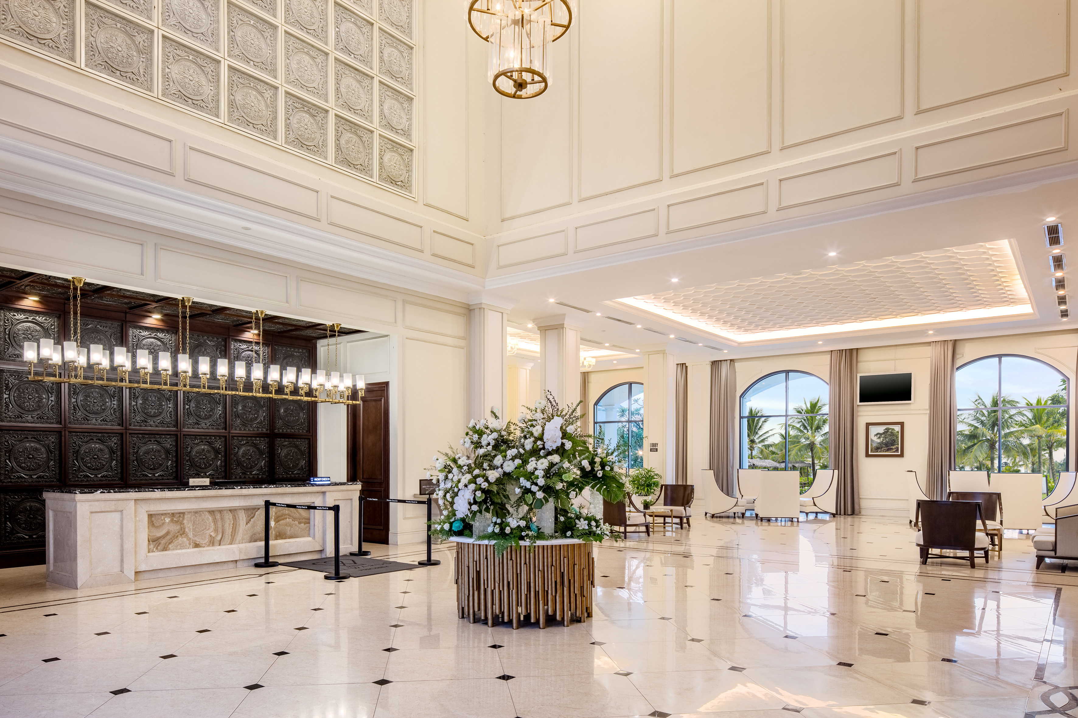 a large white room with a large table and chairs