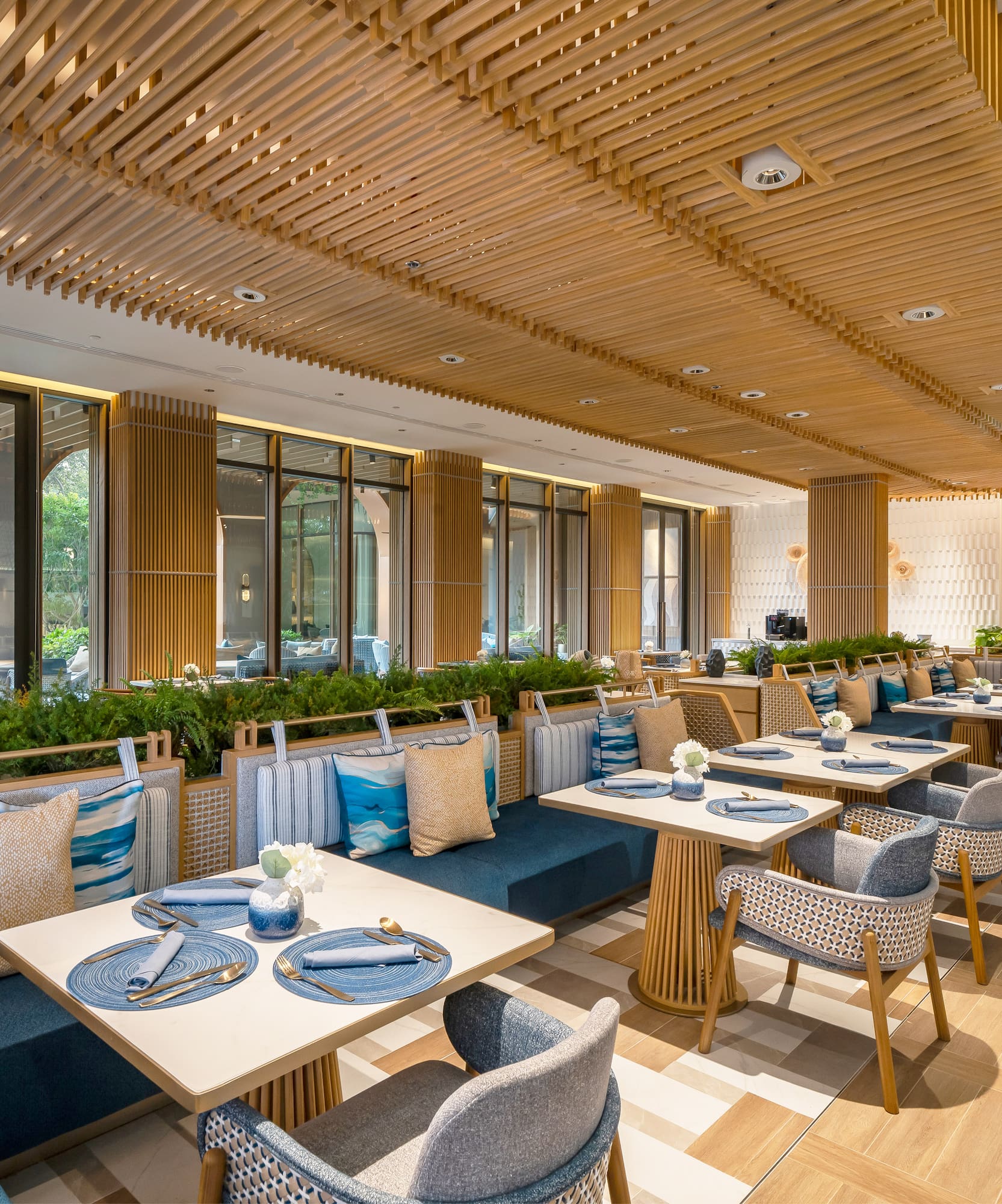 a restaurant with tables and chairs