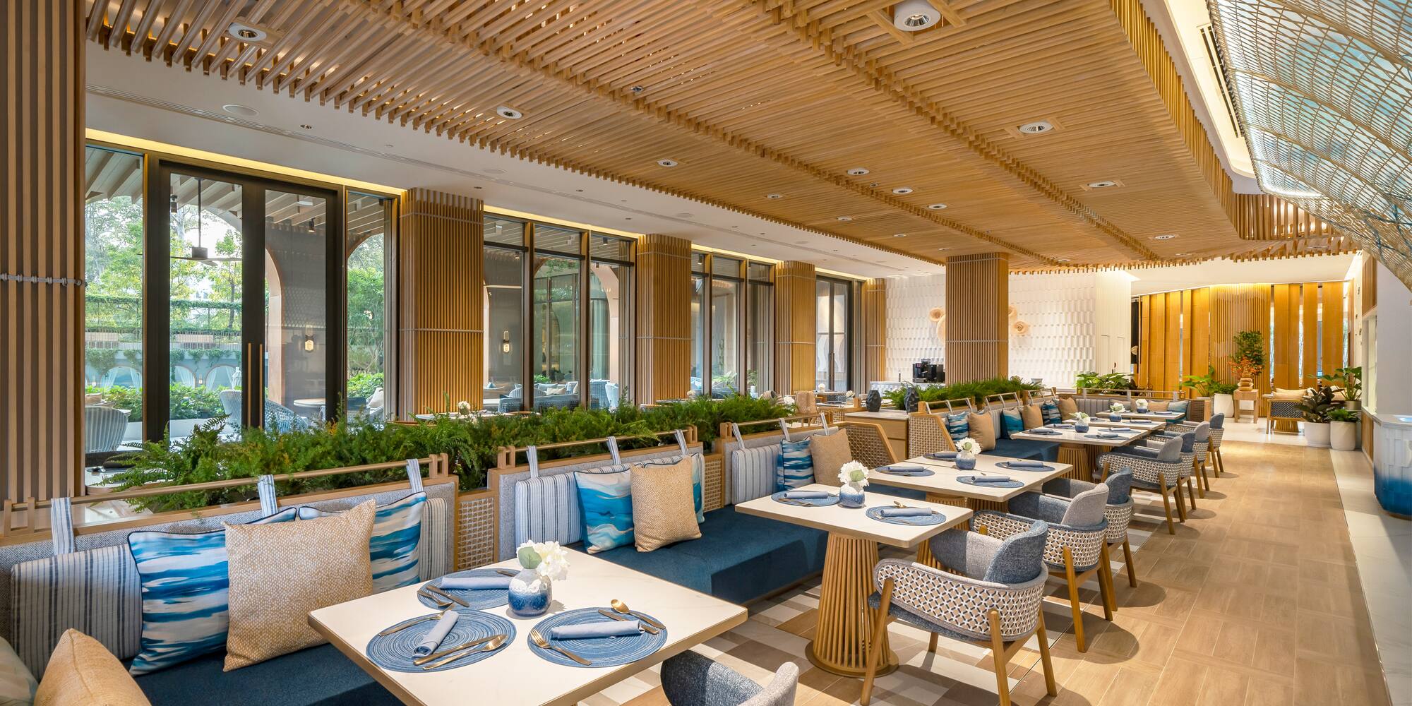 a restaurant with tables and chairs