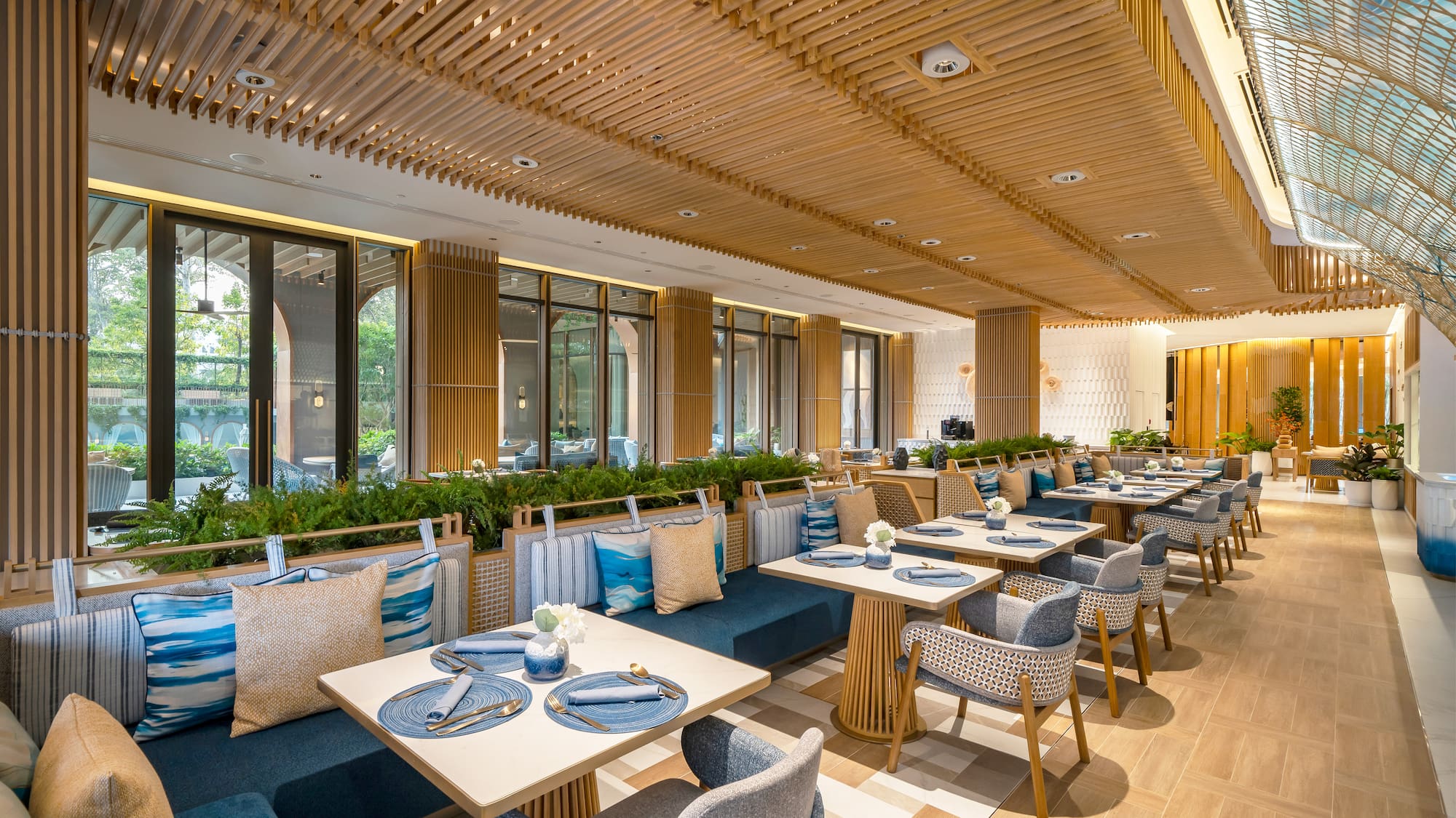 a restaurant with tables and chairs