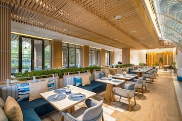 a restaurant with tables and chairs