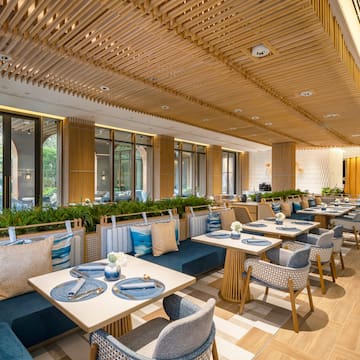 a restaurant with tables and chairs