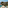 Scenic coastal resort with beach, turquoise sea, hillside villas, and swimming pools.