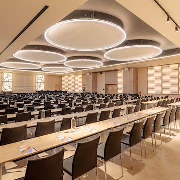 a room with tables and chairs