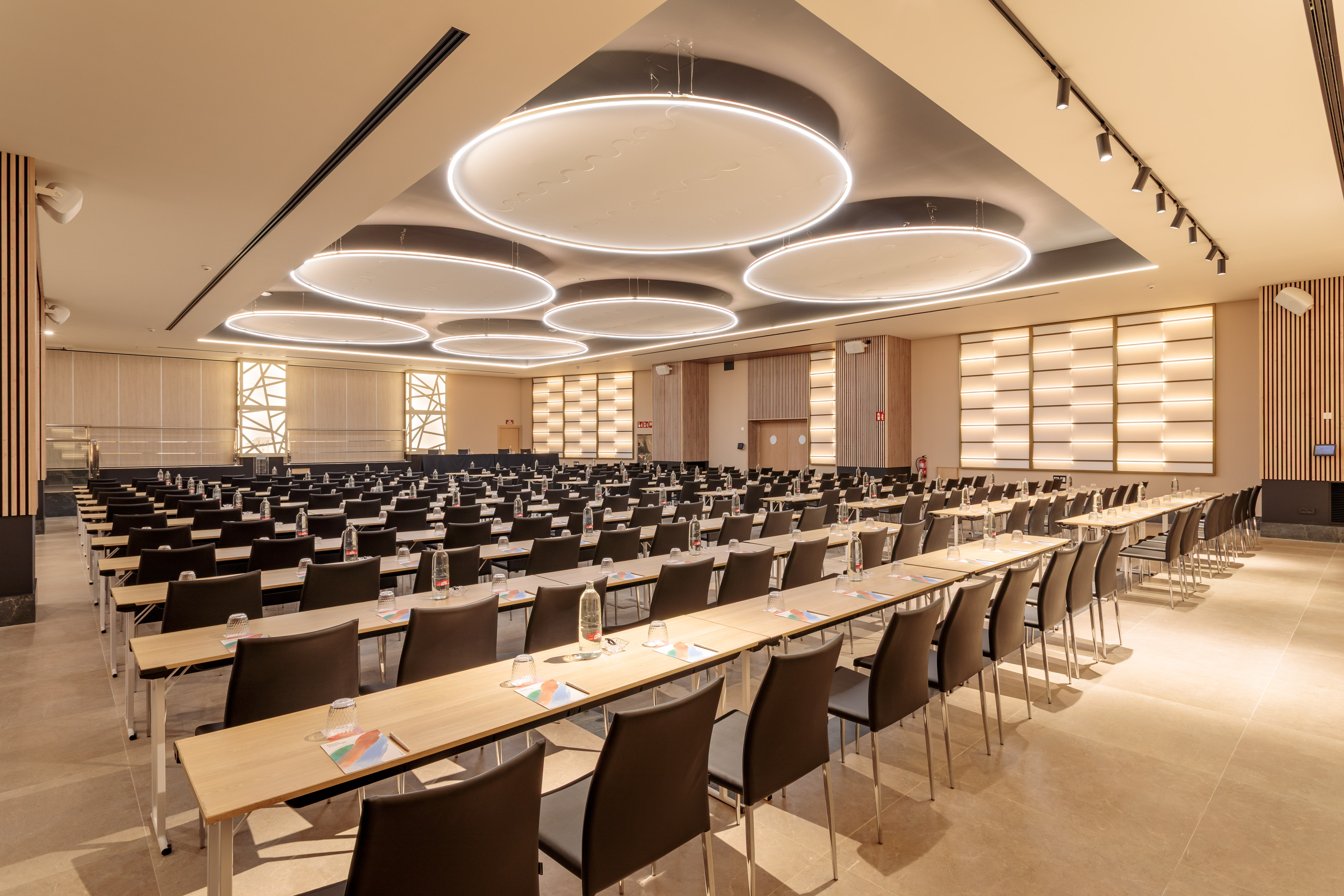 Spacious modern hotel conference room setup for meetings or events.