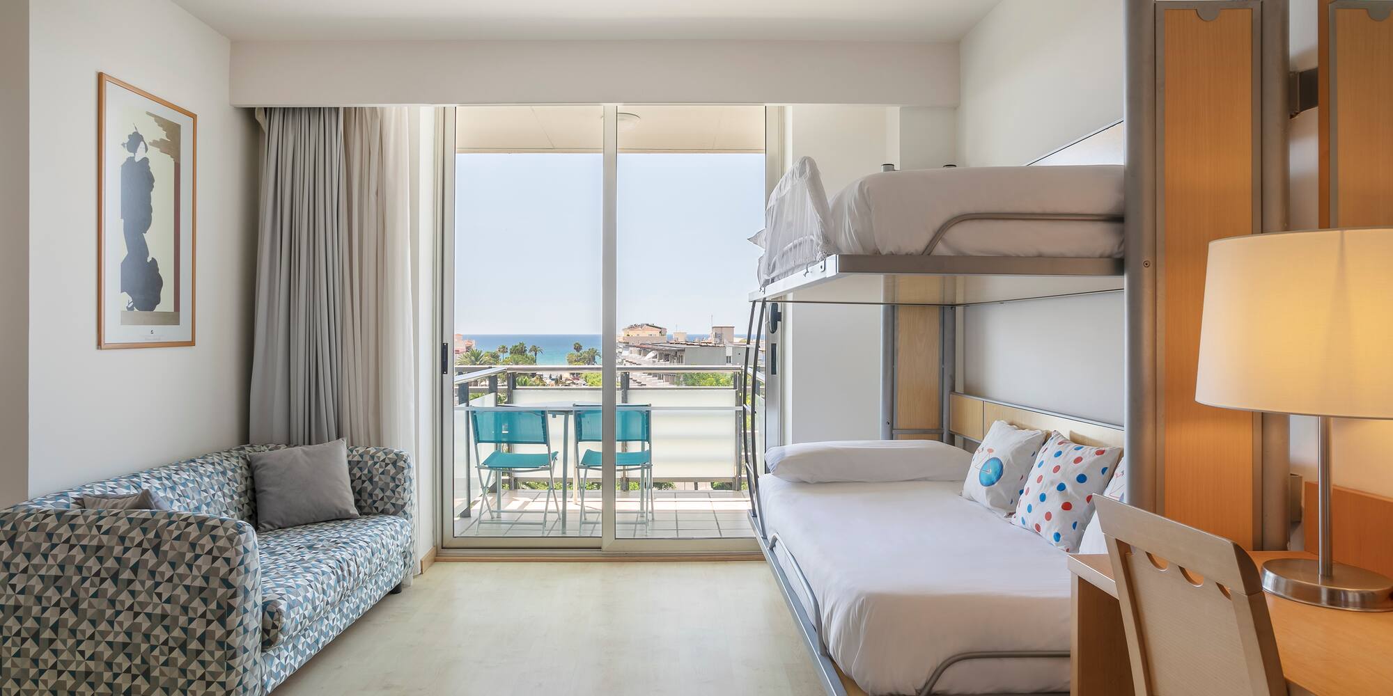 a room with a bed and couch