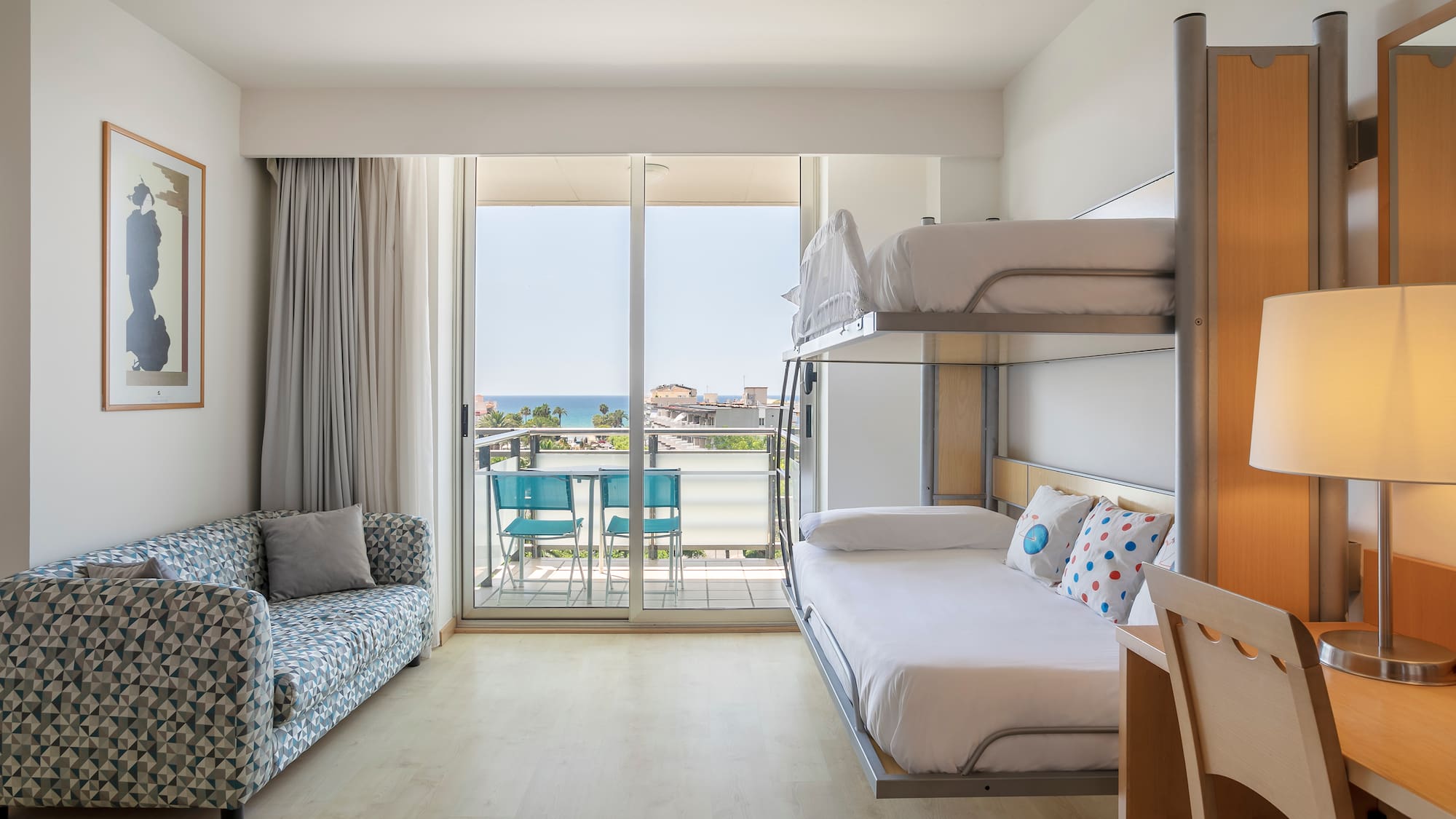 a room with a bed and couch