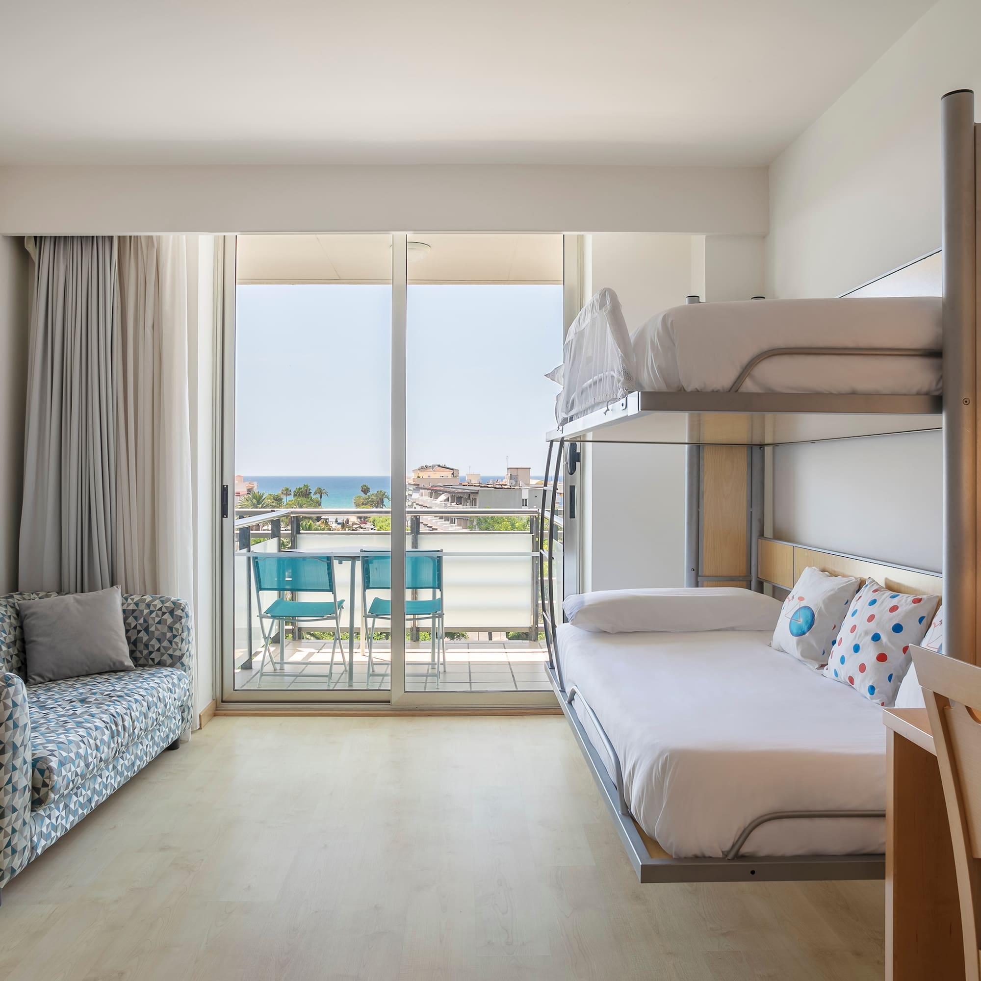 a room with a bed and couch