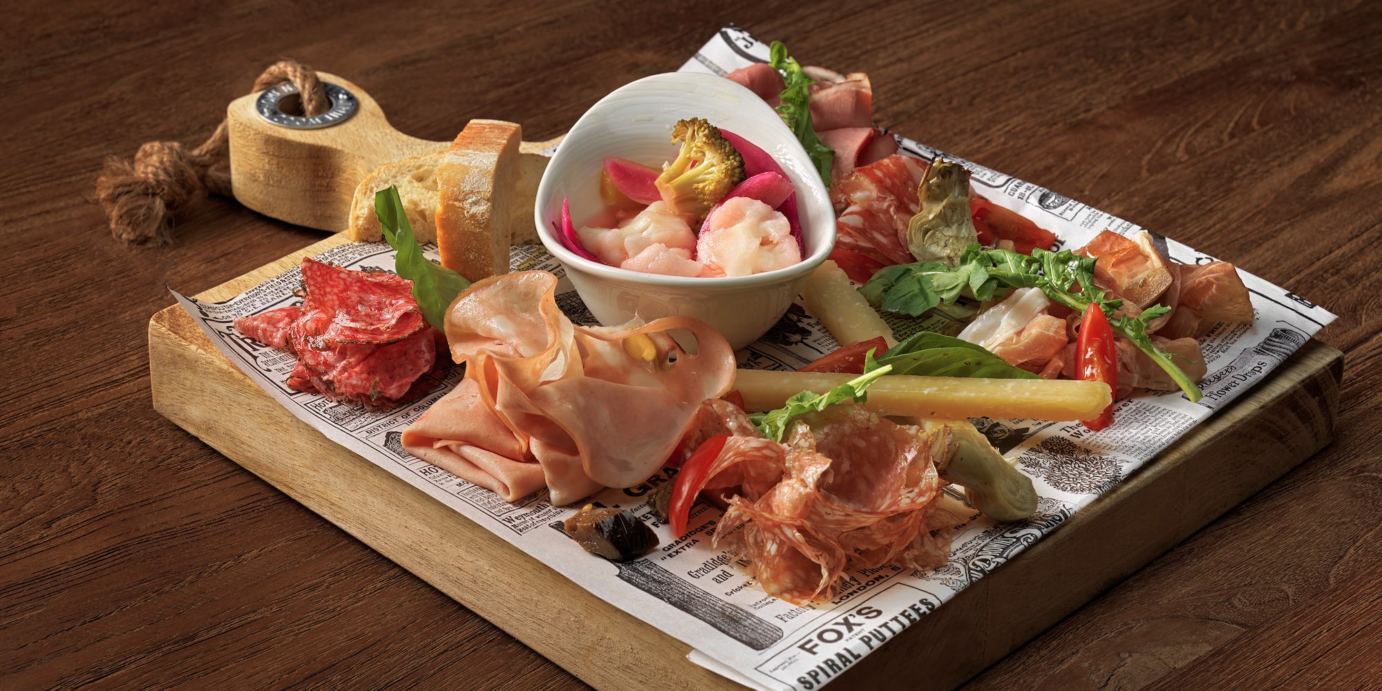 a tray of food on a wood surface