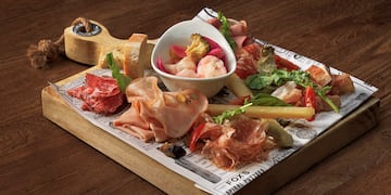 a tray of food on a wood surface