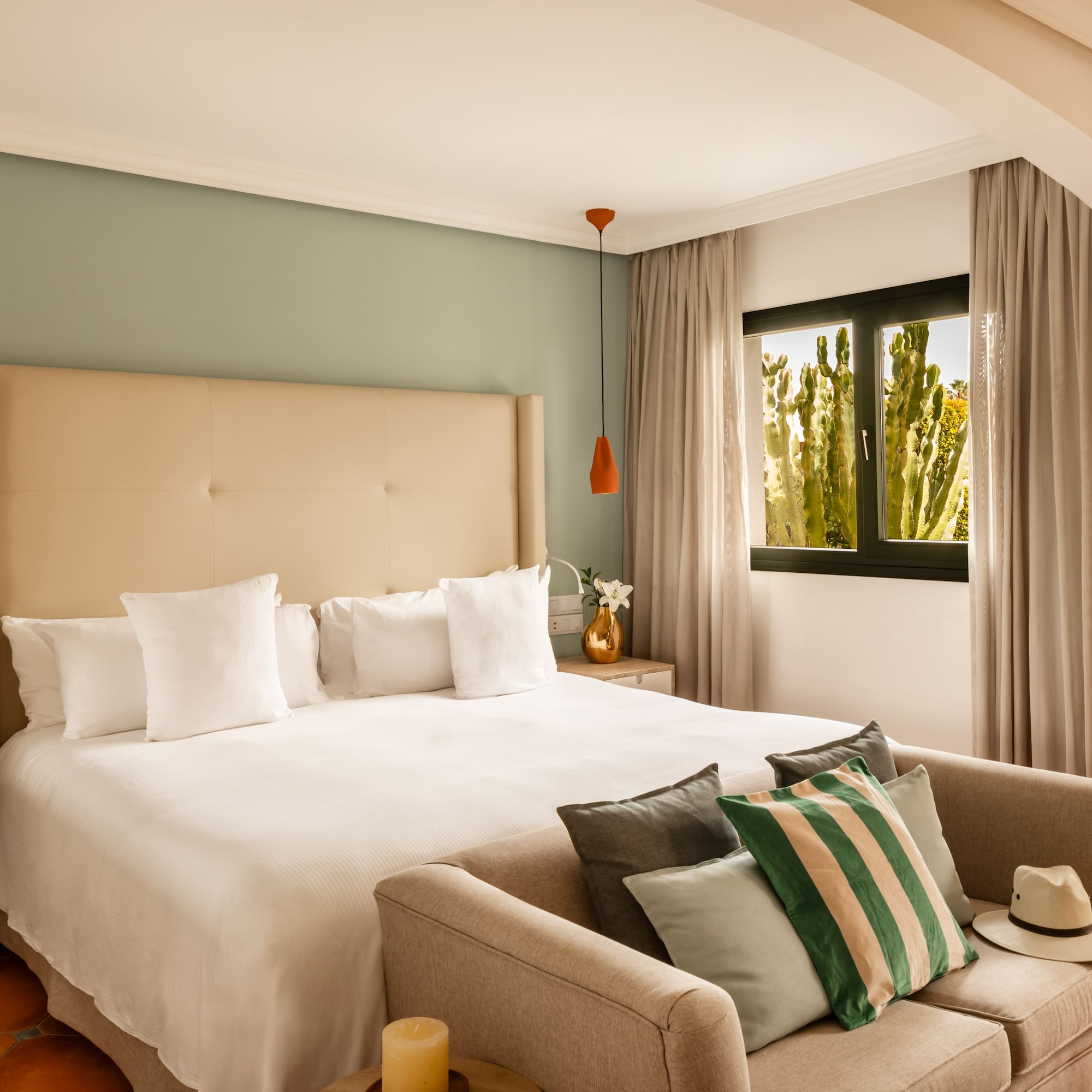 a bed with pillows in a room