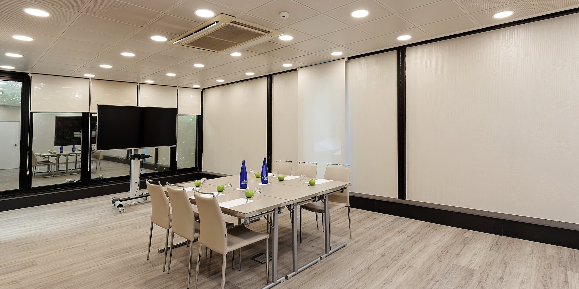 a room with a table and chairs