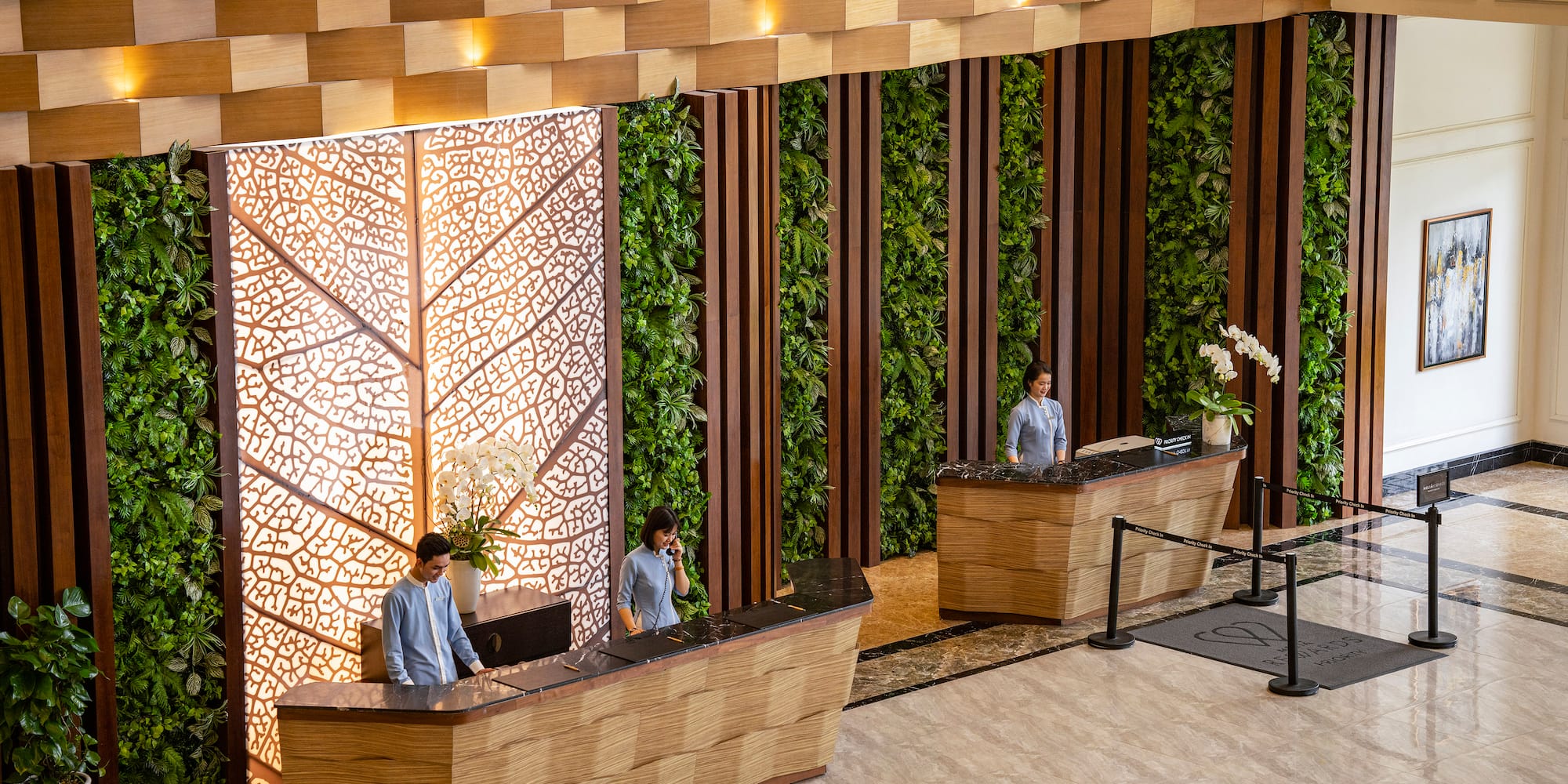 people standing at the front desks