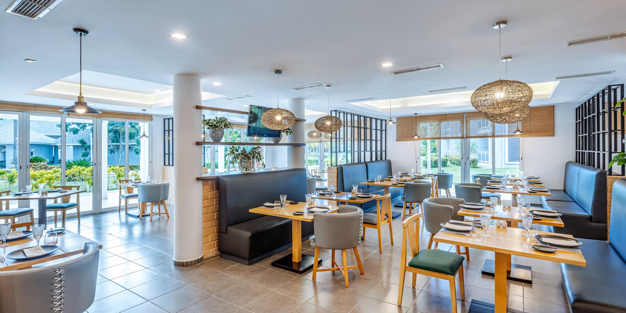 a restaurant with tables and chairs