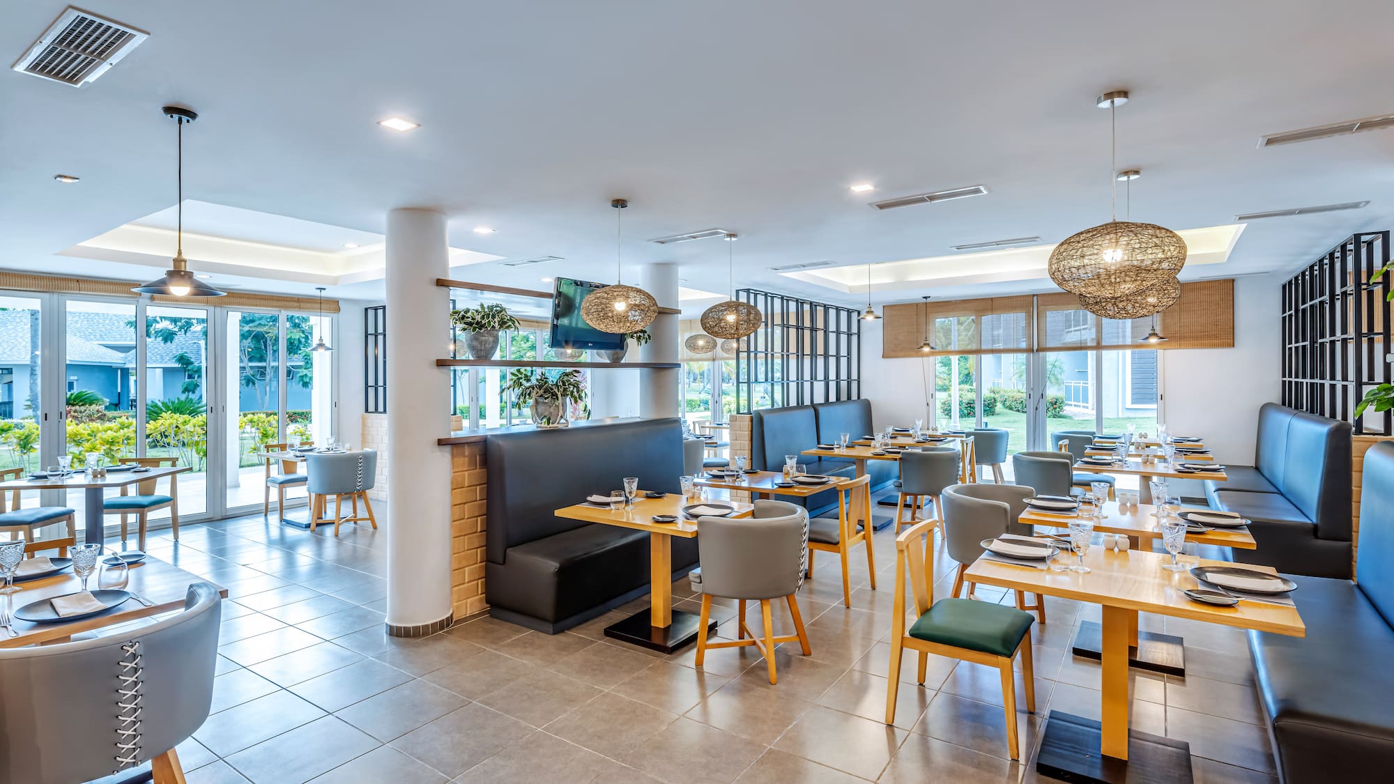 a restaurant with tables and chairs