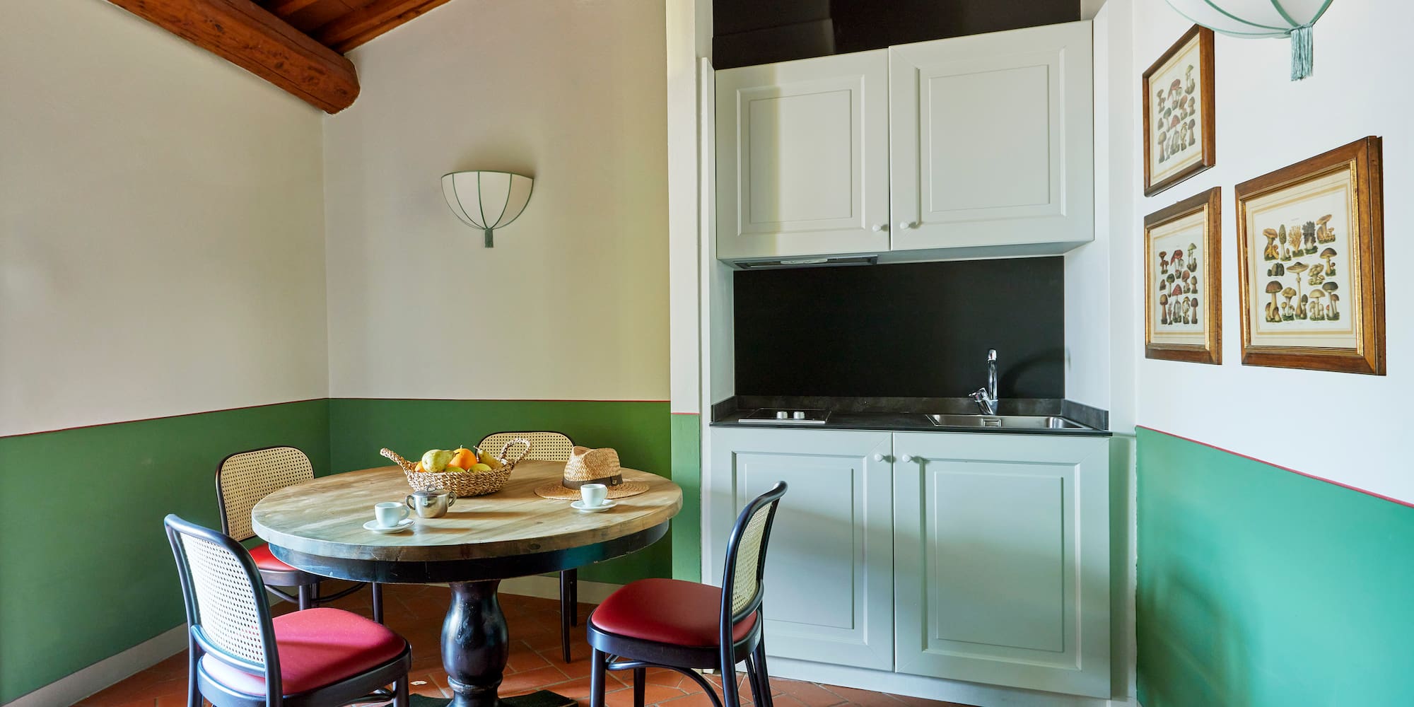 a room with a table and chairs