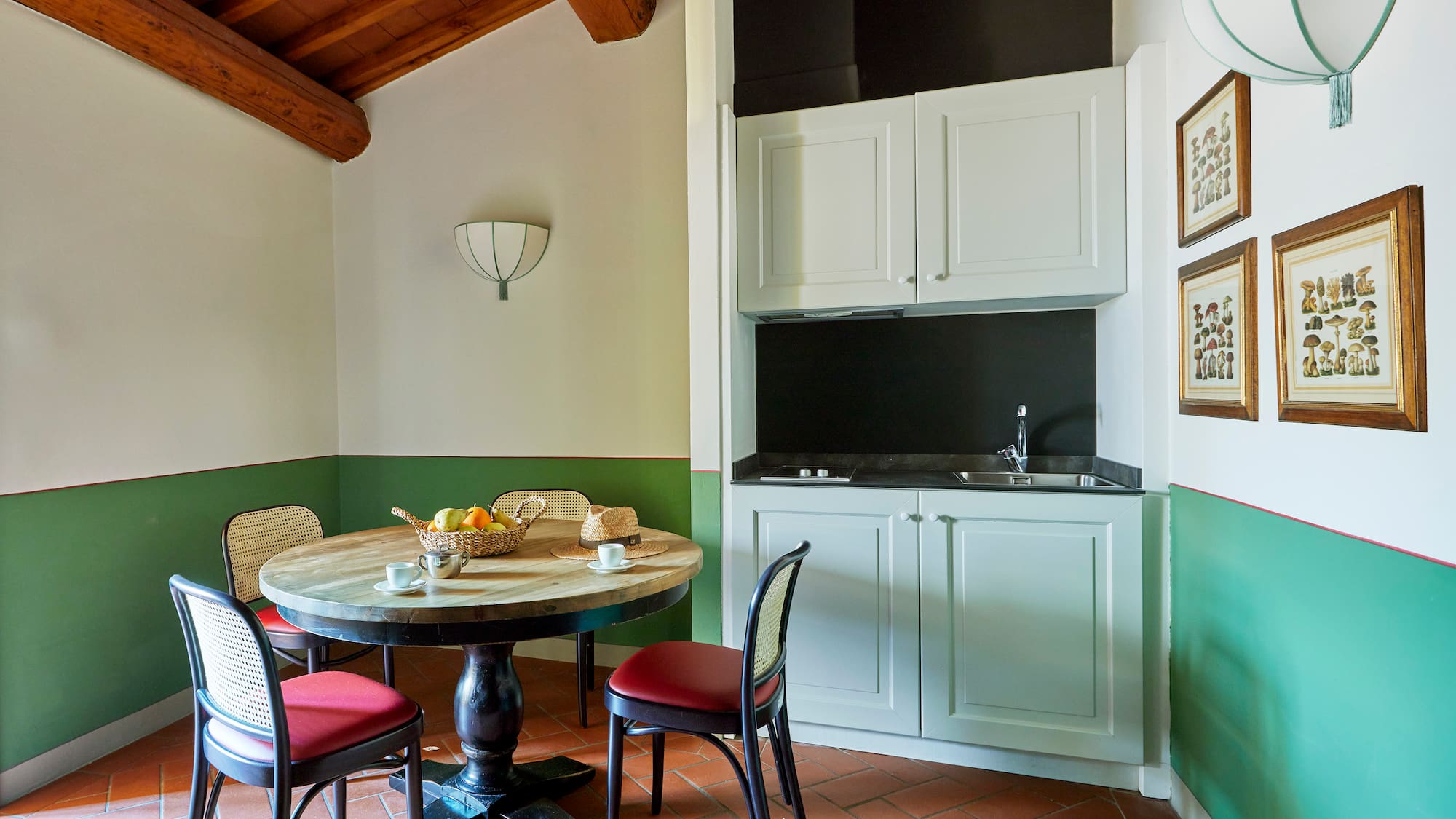 a room with a table and chairs