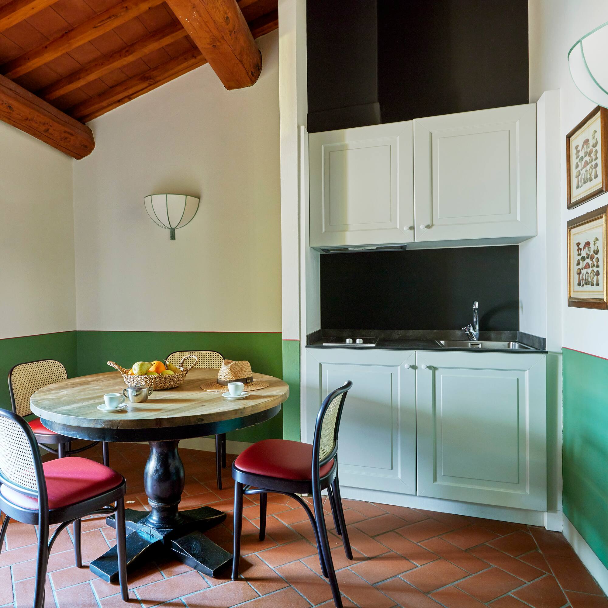 a room with a table and chairs