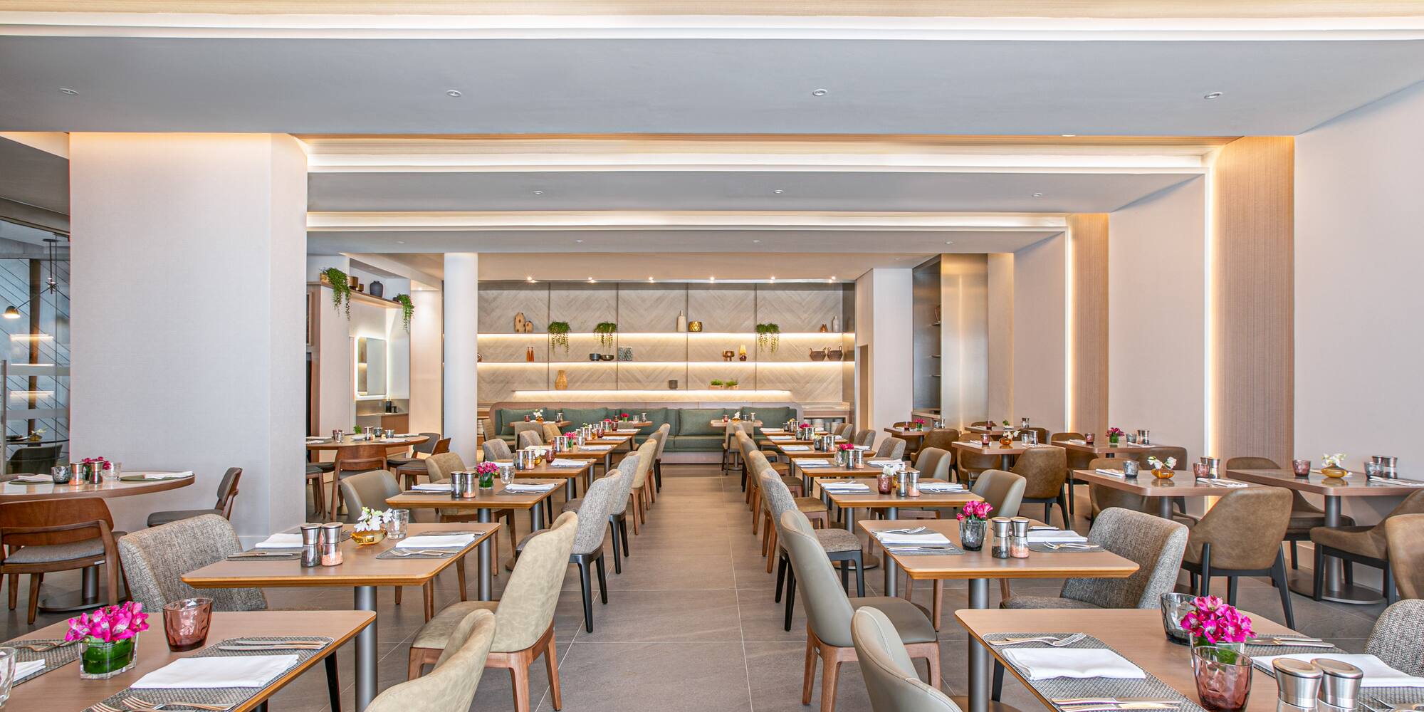 a room with tables and chairs